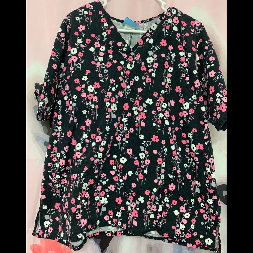 Woman’s floral scrub top